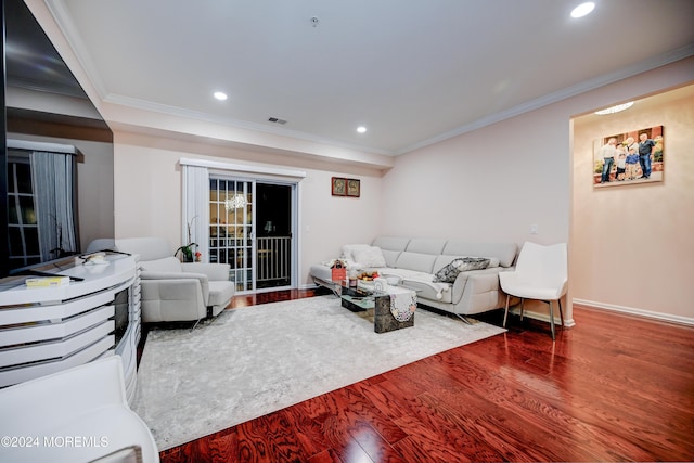 living room featuring crown molding and wood-type flooring