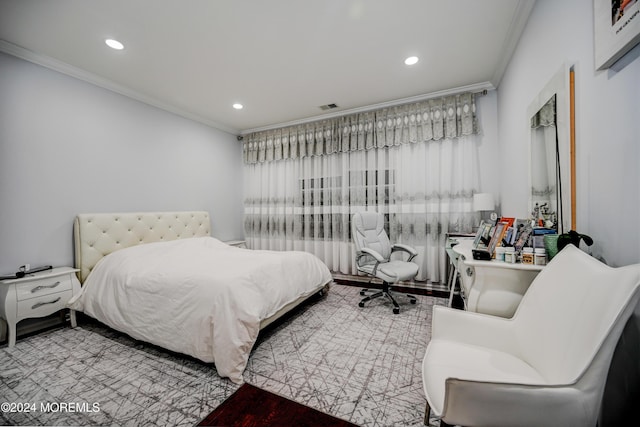 bedroom featuring crown molding