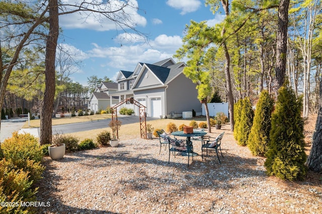 view of patio / terrace with driveway