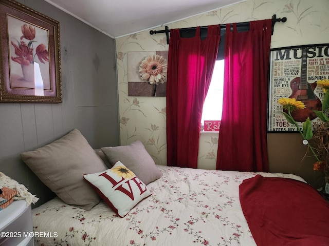 bedroom with vaulted ceiling