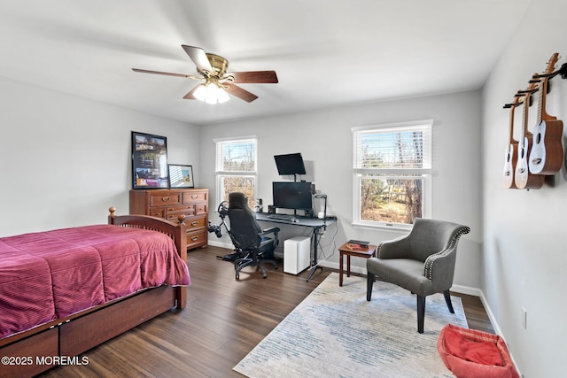 bedroom featuring ceiling fan and dark hardwood / wood-style flooring