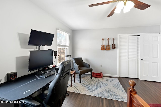 office featuring dark hardwood / wood-style floors and ceiling fan