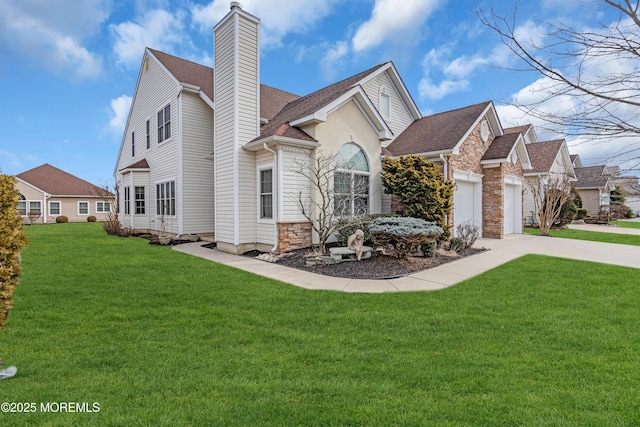 view of home's exterior with a garage and a yard