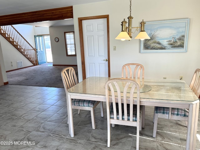 dining room with carpet floors