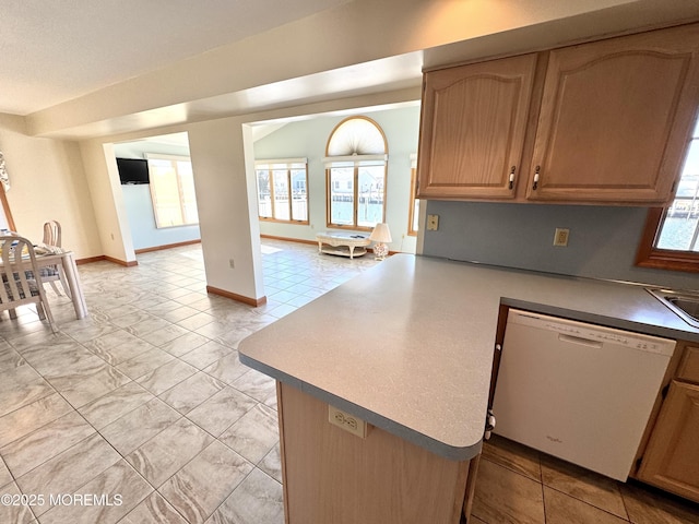 kitchen featuring kitchen peninsula and dishwasher