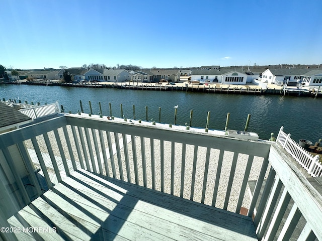 dock area with a water view