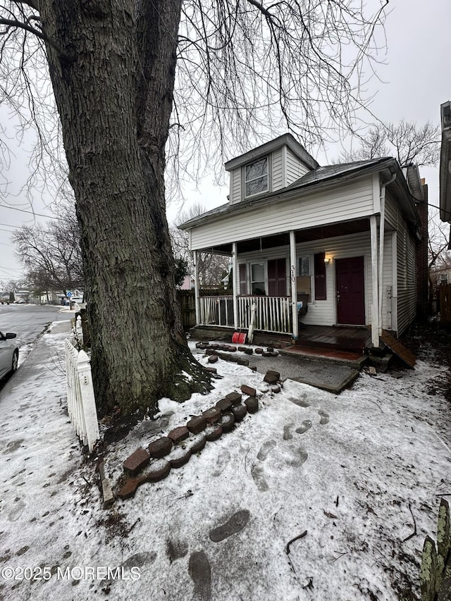 view of front facade featuring covered porch