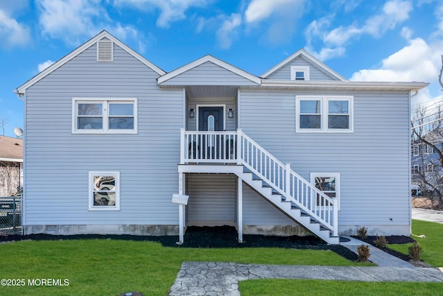 view of front of property with a front lawn