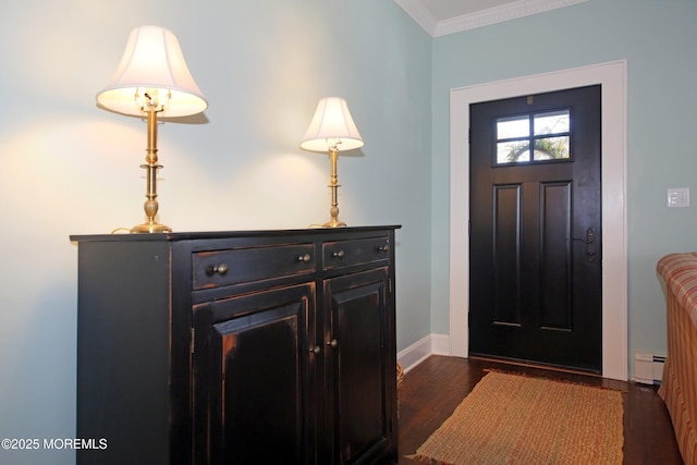 foyer entrance with baseboards, dark wood-type flooring, a baseboard radiator, and crown molding