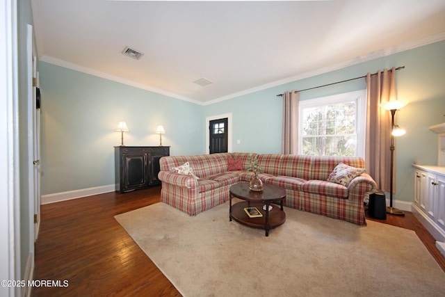 living room with baseboards, crown molding, visible vents, and dark wood-type flooring