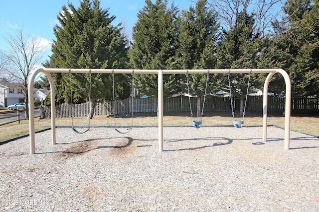 community jungle gym with fence