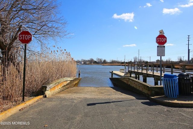 view of dock with a water view