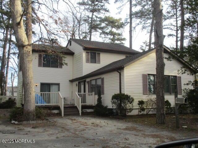 front of property with a deck