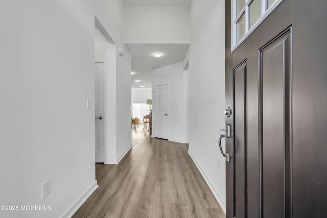 hall featuring light hardwood / wood-style flooring