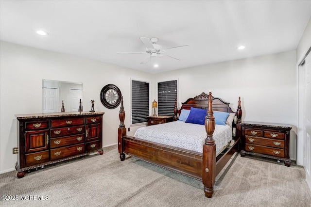 carpeted bedroom with ceiling fan