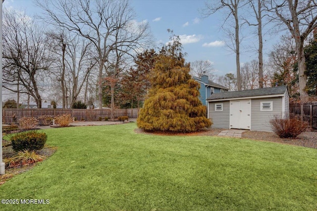 view of yard with a storage shed