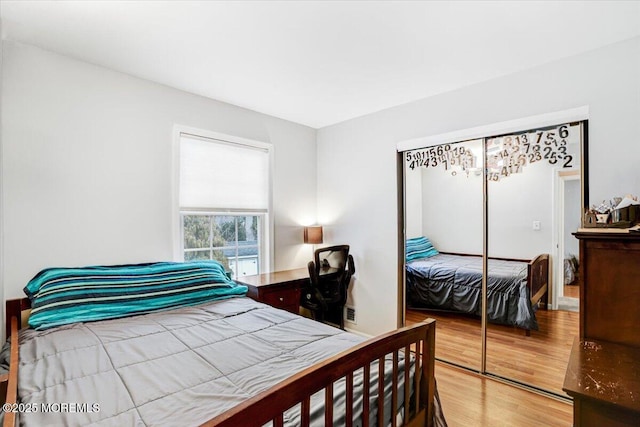 bedroom featuring hardwood / wood-style floors