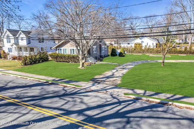 view of front of home with a front lawn