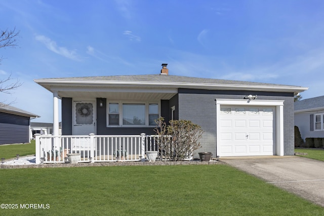 view of front facade with an attached garage, brick siding, a front lawn, and a porch