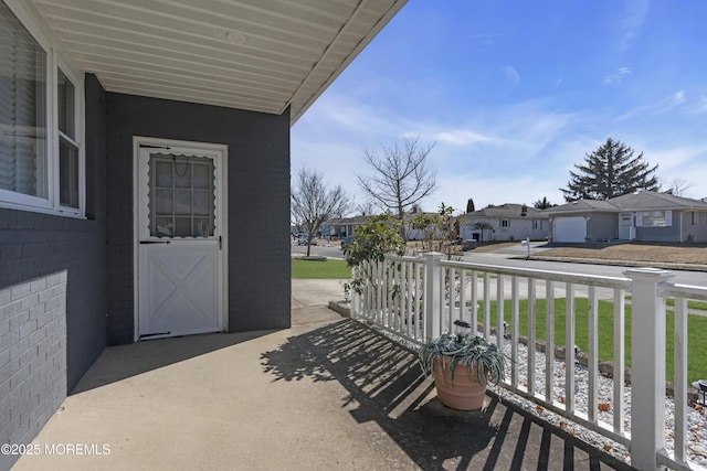 balcony with a porch and a residential view