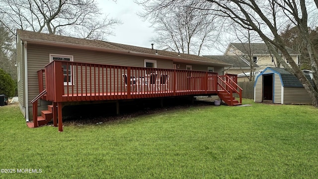 back of house featuring a yard, a shed, an outdoor structure, and a deck