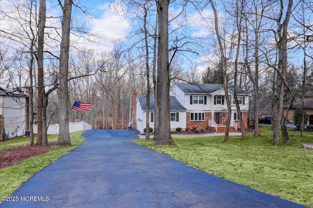 view of front of home with a front yard