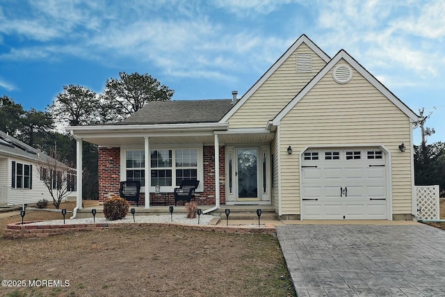 view of front of property featuring a garage