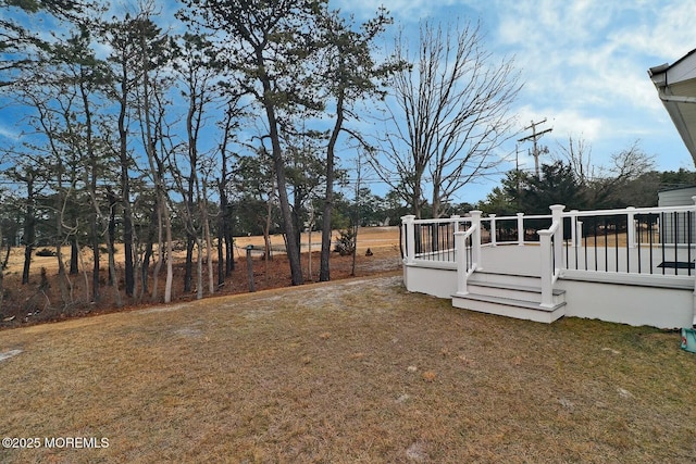 view of yard with a deck