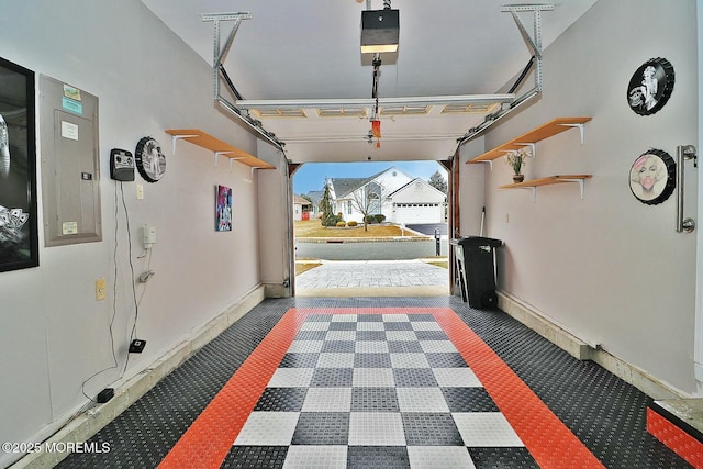 garage featuring a garage door opener