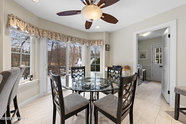 dining space with recessed lighting, independent washer and dryer, a ceiling fan, and baseboards