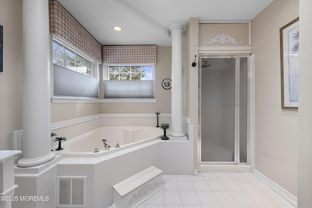 full bathroom featuring a stall shower, decorative columns, visible vents, baseboards, and a bath