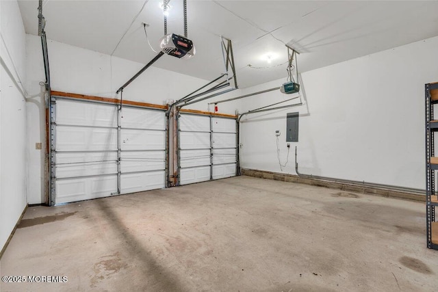 garage with electric panel and a garage door opener