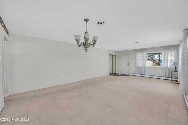 unfurnished living room featuring an inviting chandelier, visible vents, baseboard heating, and light colored carpet