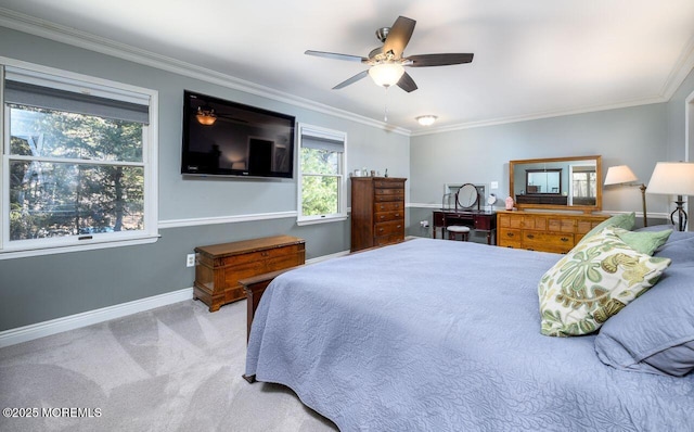 bedroom with light carpet, ceiling fan, ornamental molding, and baseboards