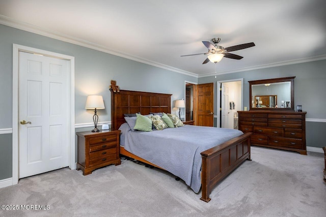 bedroom with ceiling fan, ornamental molding, and light colored carpet