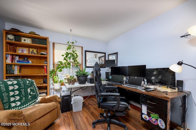 office area featuring lofted ceiling and wood finished floors