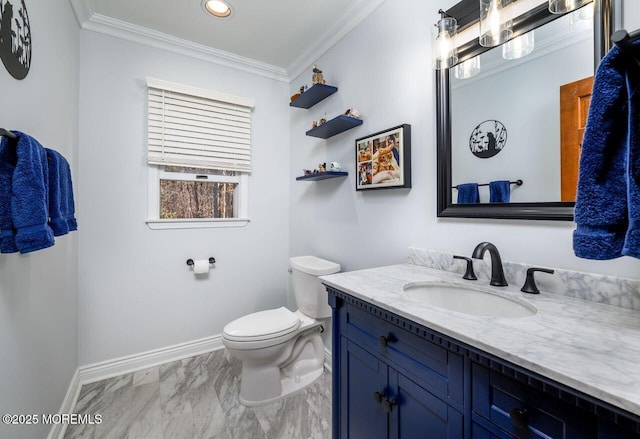 half bath featuring toilet, vanity, baseboards, marble finish floor, and crown molding