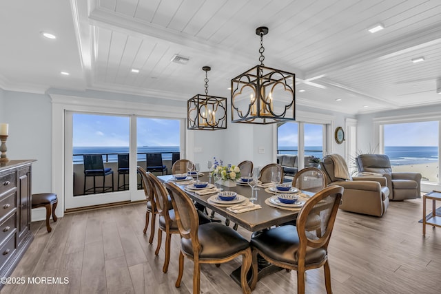 388 Ocean Ave N Unit 6D, Long Branch, NJ 07740 - dining room featuring light wood-type flooring, a chandelier, a wood ceiling with exposed beams, ornamental molding, and a water view