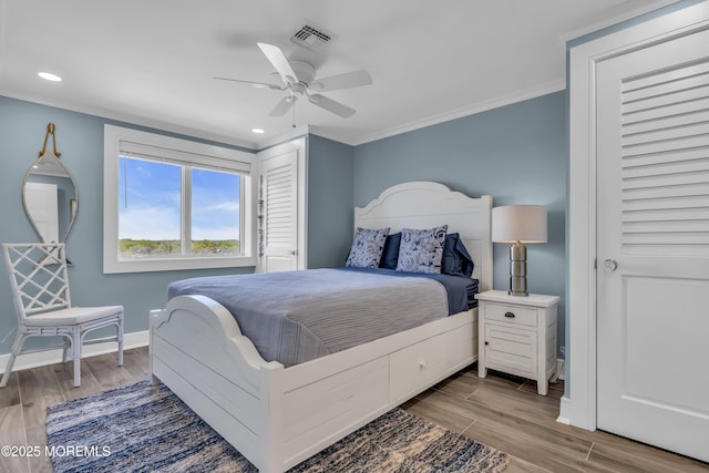 388 Ocean Ave N Unit 6D, Long Branch, NJ 07740 - bedroom with crown molding, wood finished floors, recessed lighting, and a ceiling fan