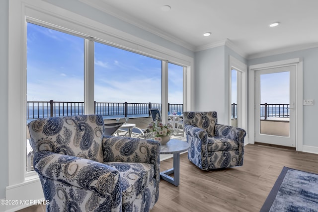 388 Ocean Ave N Unit 6D, Long Branch, NJ 07740 - living room featuring wood finished floors, ornamental molding, and recessed lighting