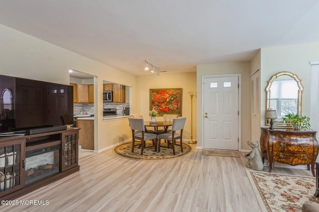 foyer entrance featuring light wood-type flooring