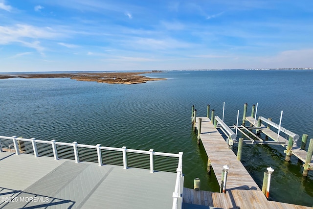 dock area featuring a water view and boat lift