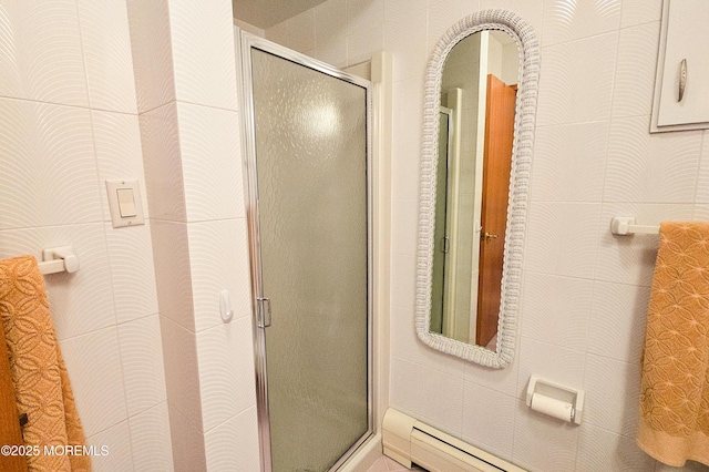 full bathroom featuring a baseboard radiator and a shower stall