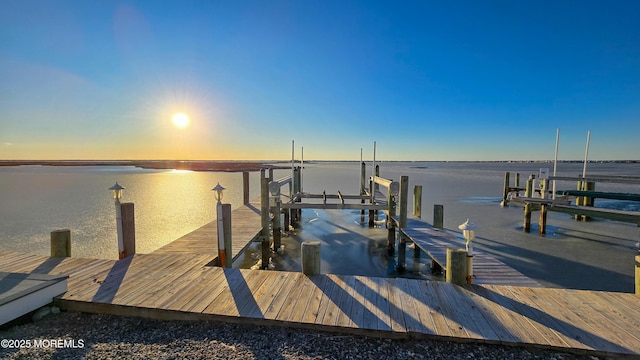 view of dock with a water view and boat lift