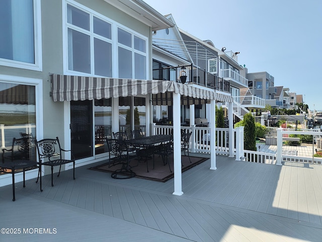 495 Boca Raton Dr Unit 497, Lavallette, NJ 08735 - wooden deck with outdoor dining area
