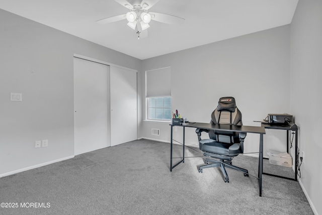 office space featuring carpet and ceiling fan