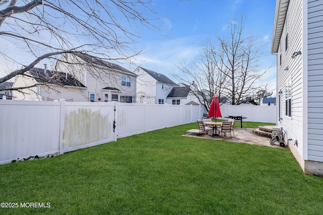 view of yard with a patio area and a fire pit