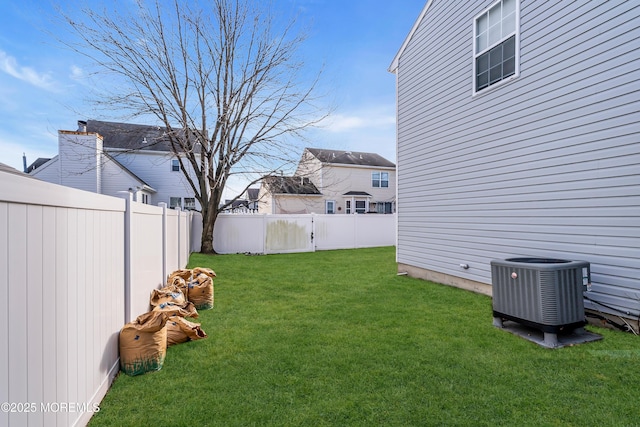 view of yard with central AC