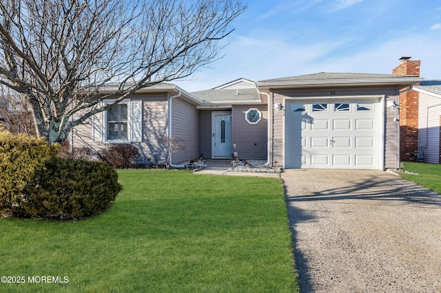 single story home featuring a front yard and a garage