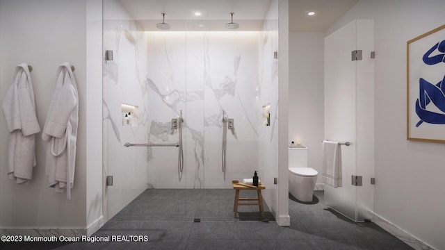 bathroom featuring an enclosed shower and toilet